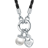 Kette schwarz Perle (synth.) weiß verziert mit Kristallen von Swarovski® weiß