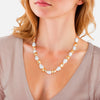 Kette gelbgold Glasperle weiß