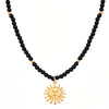 Kette mit Anhänger gelbgold Glas schwarz