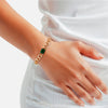 Armband gelbgold Glas grün