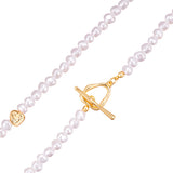 Kette gelbgold Perle (synth.) weiß